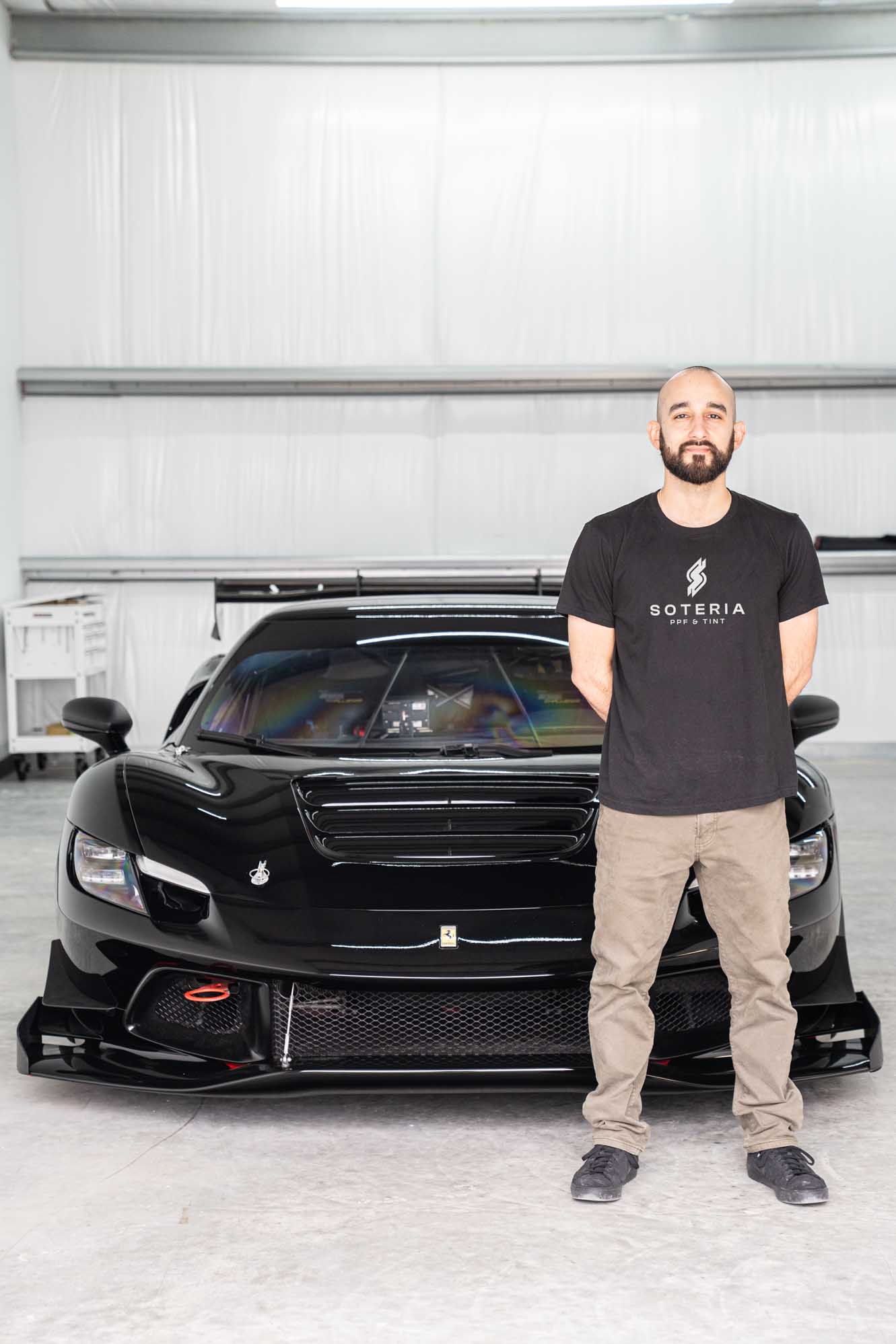 Soteria team with a Ferrari Challenge car
